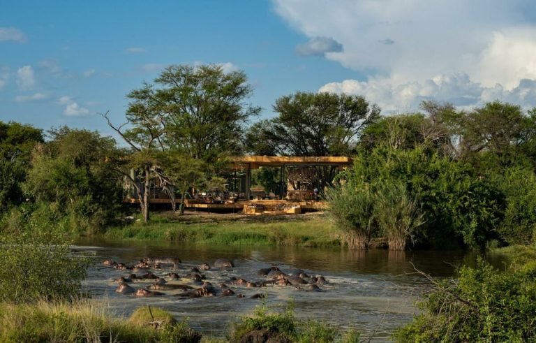 Tanzania-Grumeti-Serengeti-River-Lodge-Guest-Area-exterior-with-hippo-pod-2-1200x767